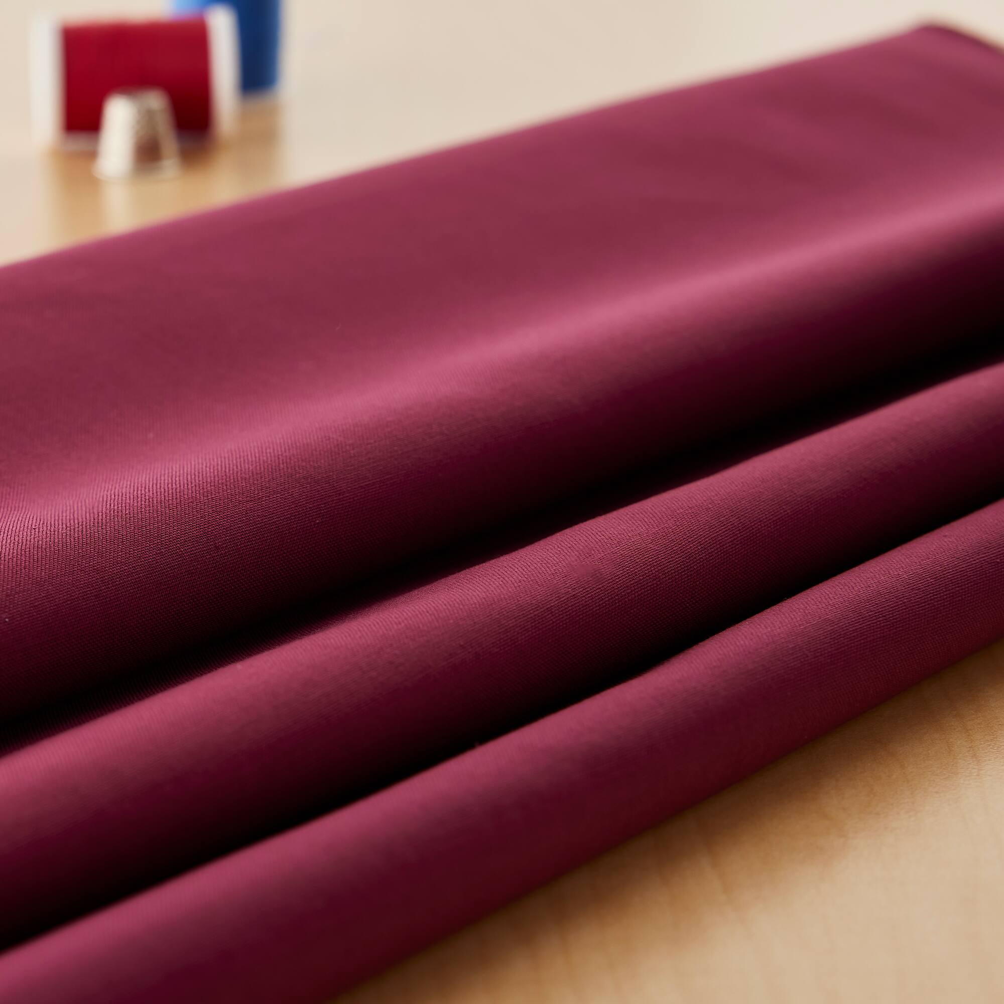 Springs Creative Burgundy Solid Cotton Fabric
